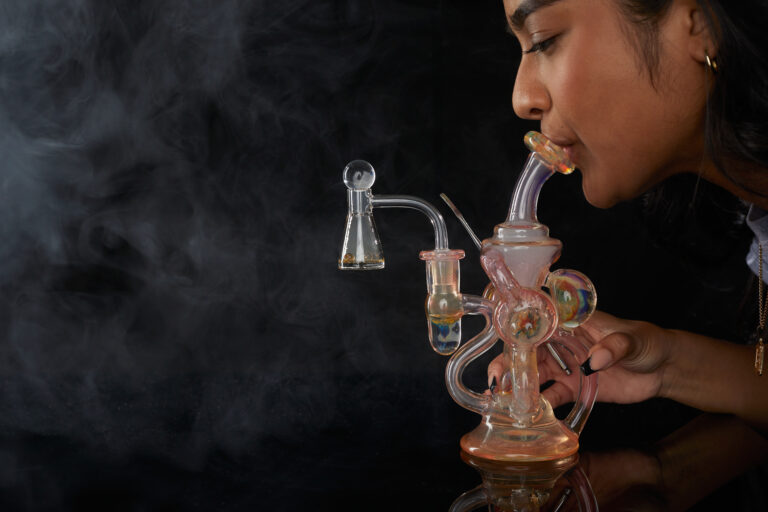 woman hitting from dab rig