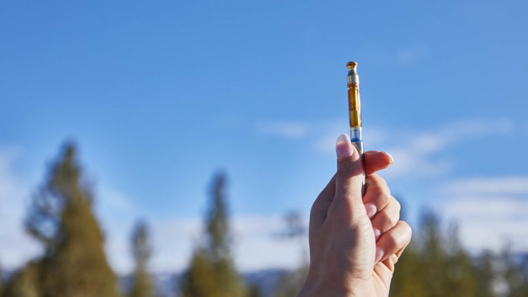 Click to see a larger version of the image vaping weed outdoors