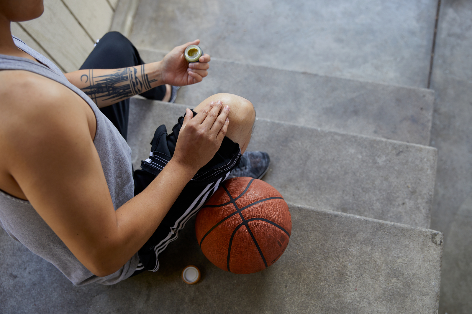 Man applies cannabis, topical