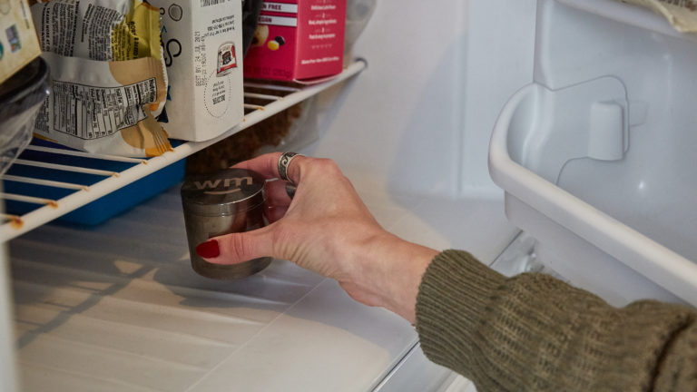 Click to see a larger version of the image cleaning weed grinder in fridge