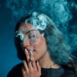 Woman smoking cannabis