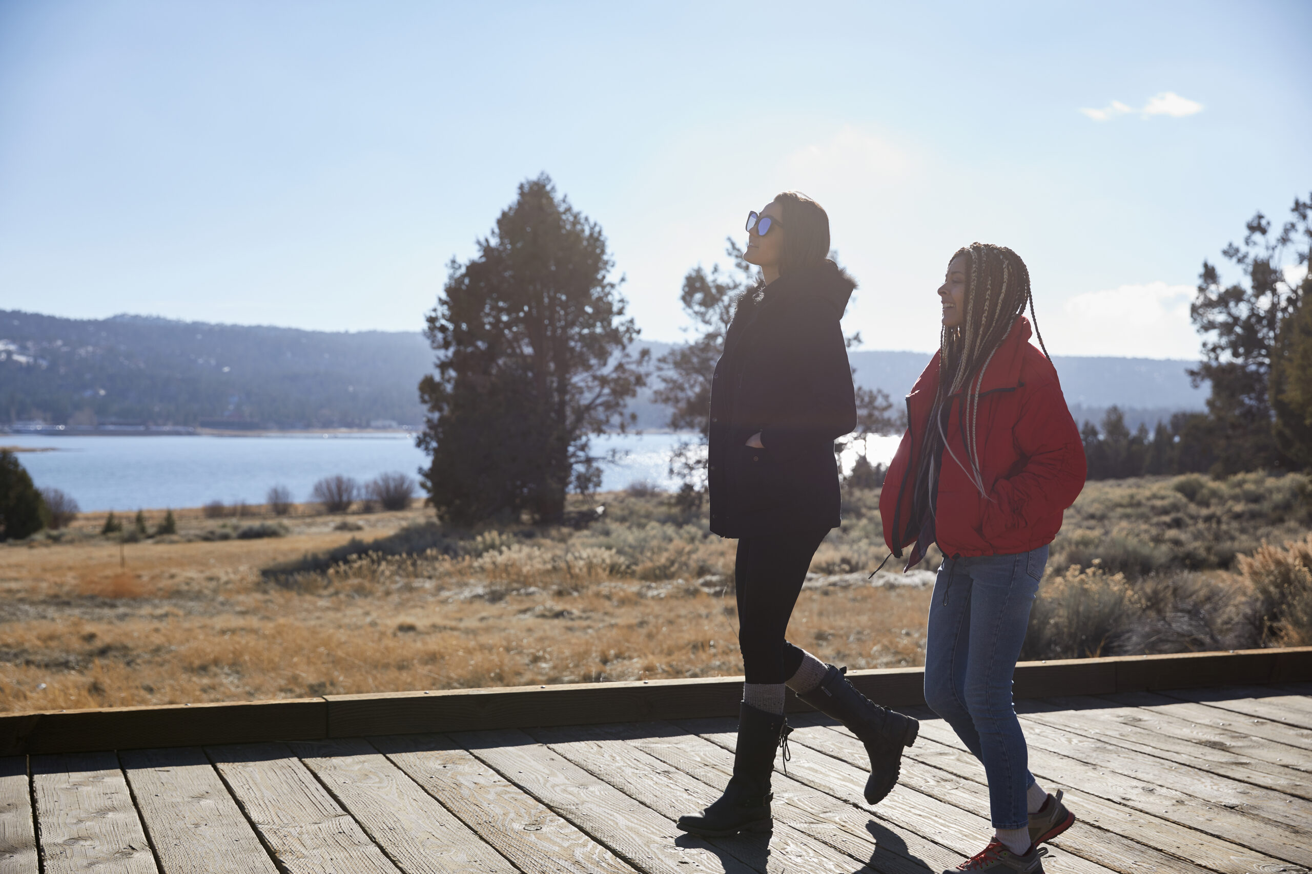 two people walking in nature