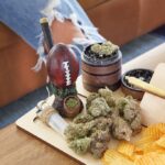 cannabis in football pipe with grinder