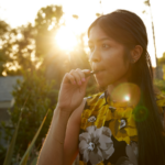 Lady hitting cannabis vape pen