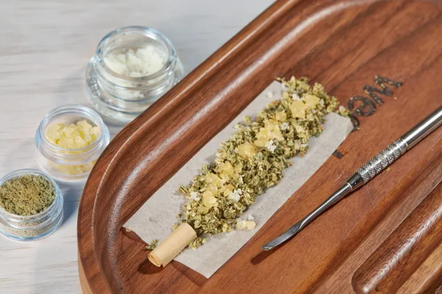 THCA diamond infused joint being rolled