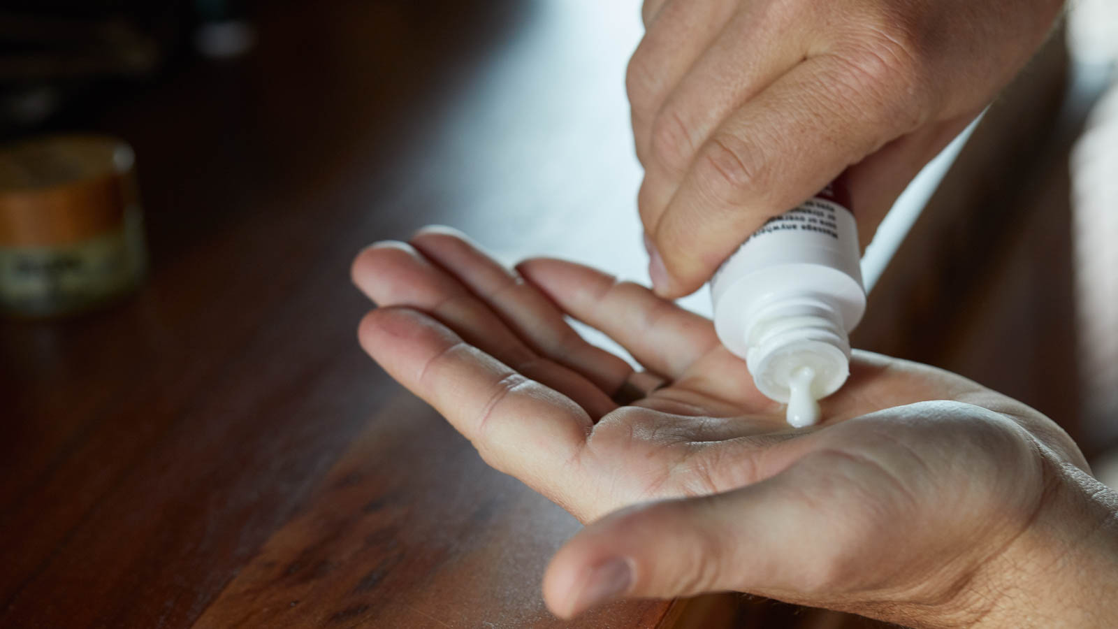 THC lotion placed in hand