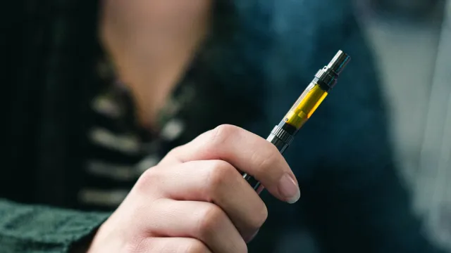 Hand holding weed pen