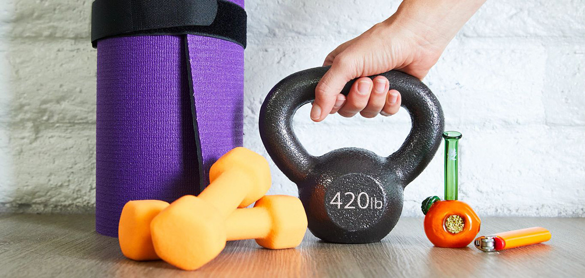 Hand grabbing a 420lb kettleball weight